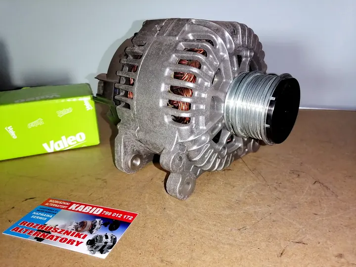 Alternator z pudełkiem części Valeo i wizytówką KABID